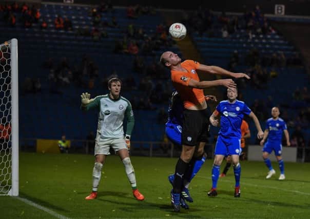 Tom Denton in action for Chesterfield at FC Halifax Town