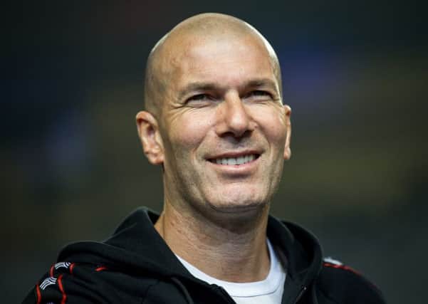 Former French football player Zinedine Zidane looks on during a promotional event for the Chinese University of Football Association in Guangzhou, in China's southern Guangdong province on November 30, 2018. (Photo by - / AFP) / China OUT        (Photo credit should read -/AFP/Getty Images)