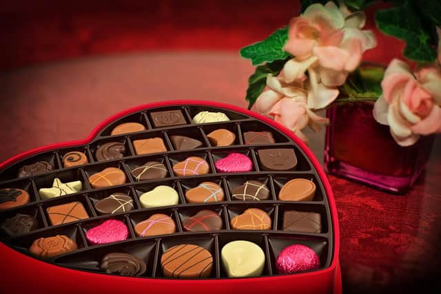 Traditional gifts include chocolates and flowers