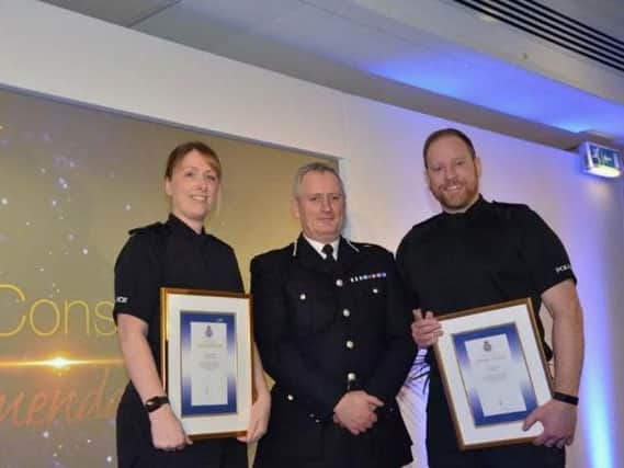 PC Lisa Sidall with PC Ian Nevin and Derbyshire Police cheif constable Peter Goodman.