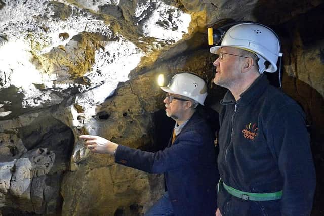 Paul Baker director of Creswell Crags and John Charlesworth tour leader.