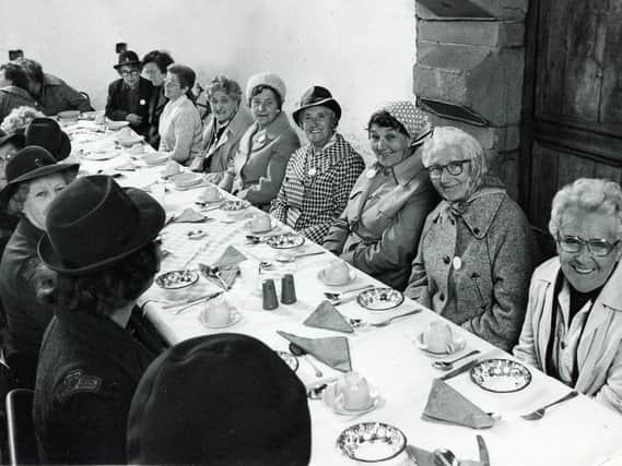 The annual Derbyshire Womens Royal Voluntary Service rally was held at Bolsover Castle in May 1979. This picture shows some of the members who attended, seated at lunch in the main hall.