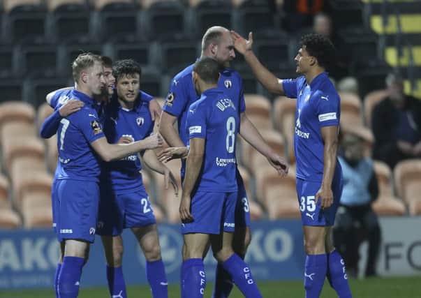 Chesterfield's players celebrate a goal in their win over Barnet. Picture by Shibu Preman/ahpix.com
.