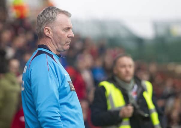 Picture Greg Dunbavand/AHPIX LTD, National League, Wrexham vs Chesterfield FC, Racecourse Ground, 02/03/19, K.O 3pm

Chesterfield manager John Sheridan watches on as his side face Wrexham.

Howard Roe>>>>>>>07973739229