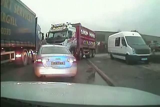 The Audi was boxed in by an HGV driver