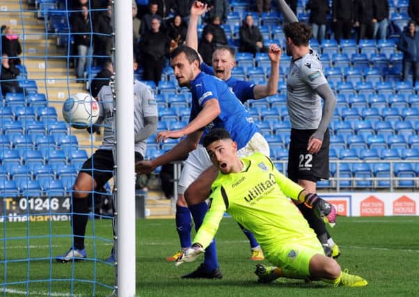 Chesterfield FC v Eastleigh.
Haydn Hollis watches his shot in to the back of the net.