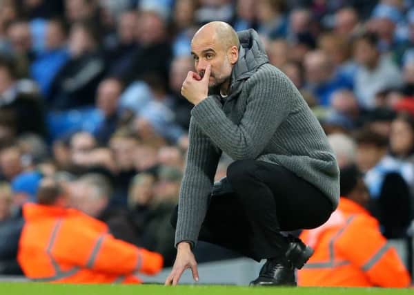 Pep Guardiola would be happy to extend his contract as manager of Manchester City. (Photo by Alex Livesey/Getty Images)