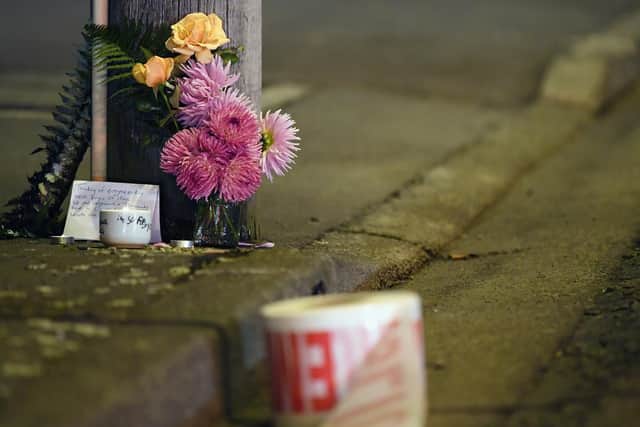 A floral tribute is seen on Linwood Avenue near the Linwood Masjid on March 15, 2019 in Christchurch, New Zealand. (Photo by Kai Schwoerer/Getty Images)