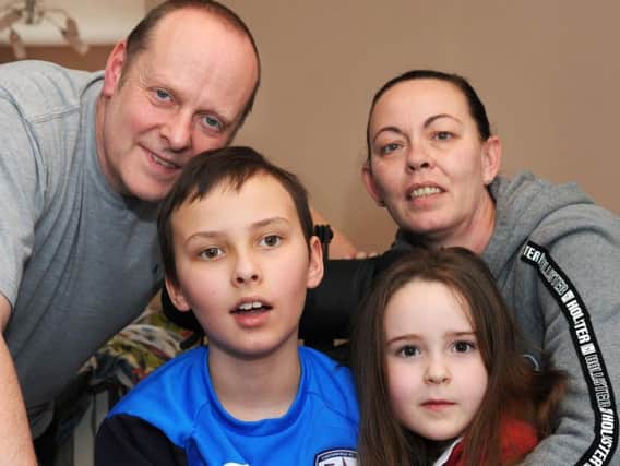 Will Downes, 10, with dad Chris, mum Emma and sister Ella, 7.