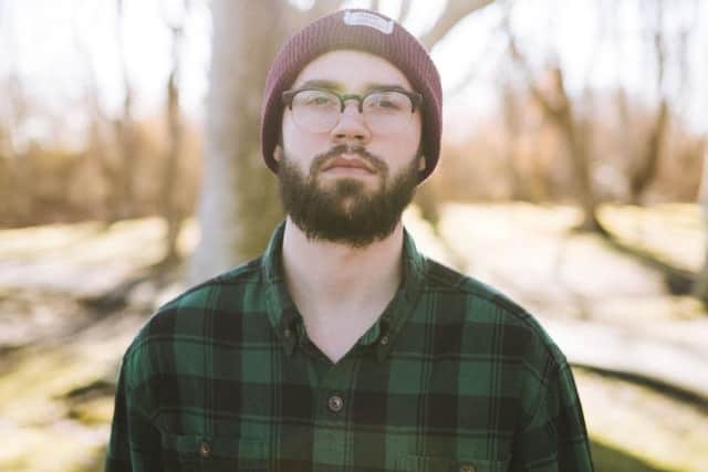 This is a man who likes to walk on the wild side. Pair a checked shirt with jeans and a woolly hat and you've got the look.