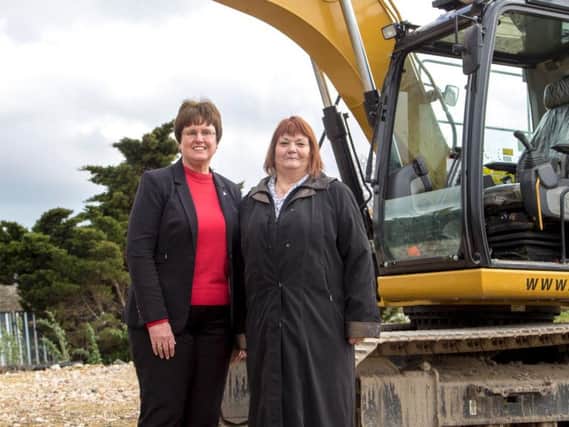 Councillor Tricia Gilby, leader of Chesterfield Borough Council, and Coun Chris Ludlow, cabinet member for health and wellbeing, as work begins to build the new artificial pitch on the site of the former Queen's Park Sports Centre.