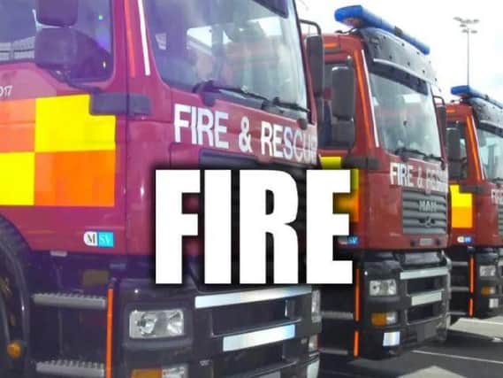 Three fire crews battled a Chesterfield flat fire.