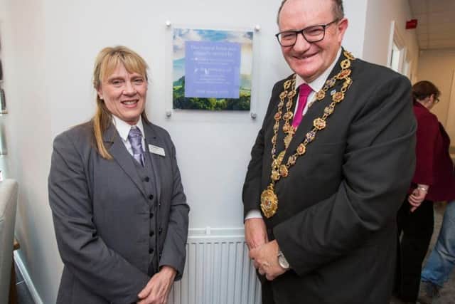 West Bars Funeral Director Margo Gasston and Mayor of Chesterfield Councillor Stuart Brittain officially reopen the home following the rededication ceremony.