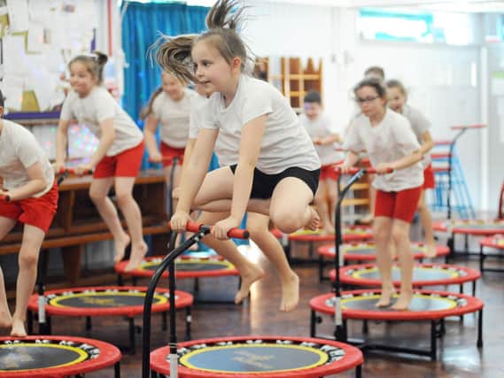 St Joseph's school pupils take part in a mini trampolining session delivered by Boogie Bounce and Olympian Bryony Page. Pictures by Jason Chadwick.