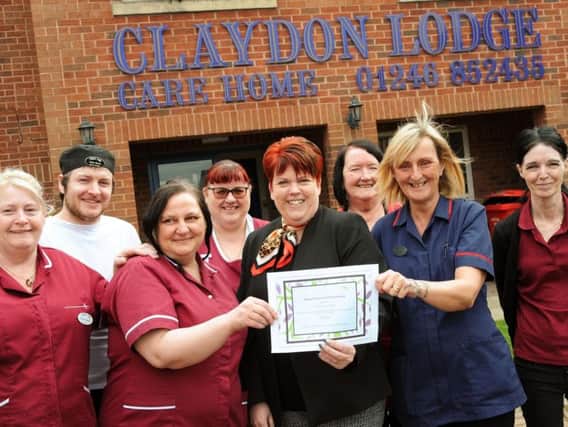 Michaela Whitehall, fourth right, general manager of Claydon Lodge Care Home, is pictured with some of her staff whose work has been recognised with the Derbyshire  County Council Dementia Premium Award. Picture by Anne Shelley.