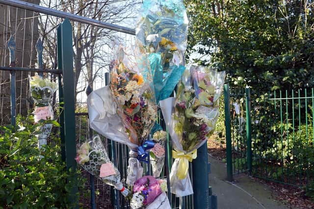 Floral tributes left at the scene of the collision on Park Road, Chesterfield.
