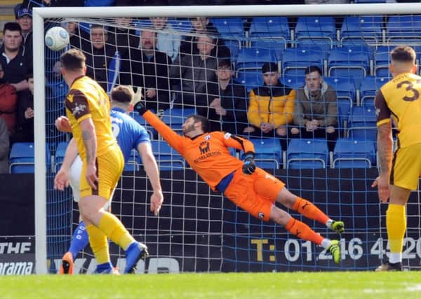 Chesterfield FC v Sutton Utd.
Shwan Jalal watches has a Sutton strike swerves to the right of the goal.
