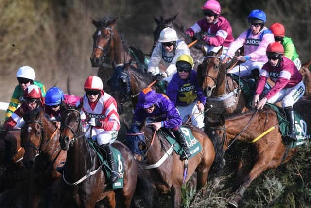 The Grand National: a race full of colour and drama. (PHOTO BY: Laurence Griffiths/Getty Images)