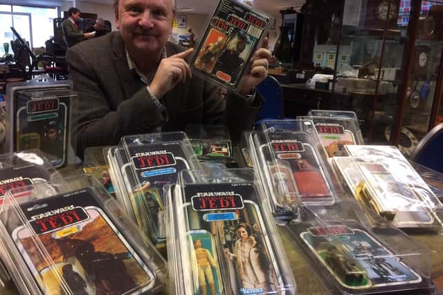 Hansons toy valuer Steve Fulford with the newly-discovered Star Wars toys.