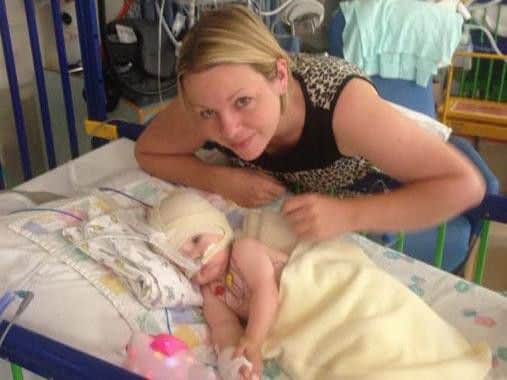 Baby Lucy with mum Tracey in hospital.