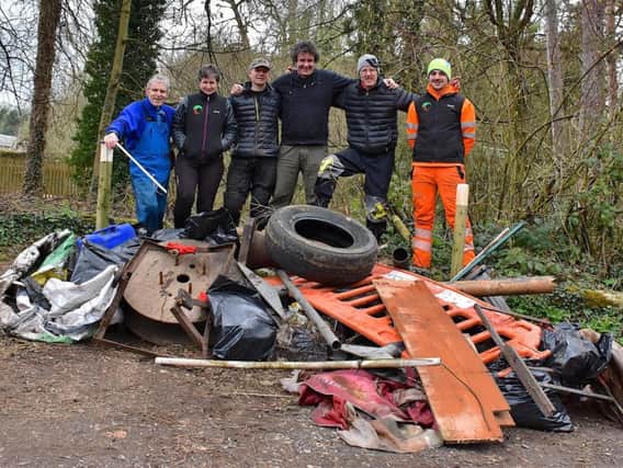 The Paddle Peak group with the haul of rubbish pulled from the River Derwent in Matlock Bath.