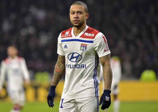 Lyon's Dutch forward Memphis Depay could be a target of Liverpool. ROMAIN LAFABREGUE/AFP/Getty Images)