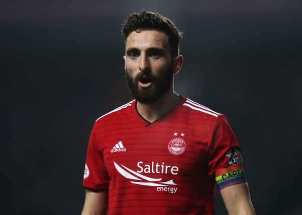 GLASGOW, SCOTLAND - DECEMBER 05: Graeme Shinnie of Aberdeen is seen wearing a Rainbow arm band during the Scottish Ladbrokes Premiership match between Rangers and Aberdeen at Ibrox Stadium on December 5, 2018 in Glasgow, Scotland. (Photo by Ian MacNicol/Getty Images)