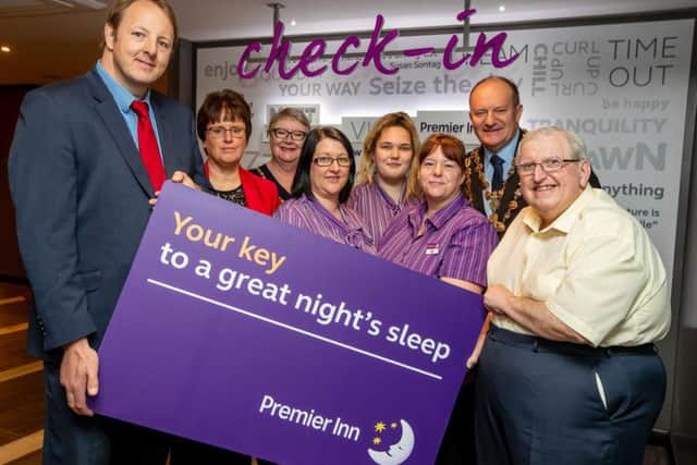 Left to right, Chesterfield MP Toby Perkins, leader of Chesterfield Borough Council Tricia Gilby, Chesterfield Mayoress Ann Brittain, ground floor hotel team members Sharon Smith, Chloe Priest and Nicola Birchall, Chesterfield Mayor Stuart Brittain and former Co-op manager Mike Harrington.