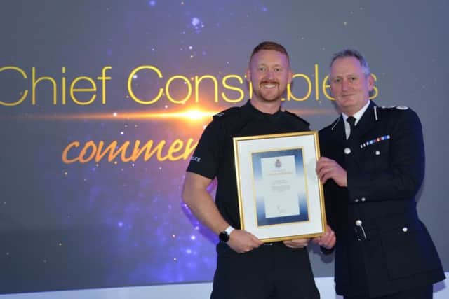 PC Mark Durham with his award.