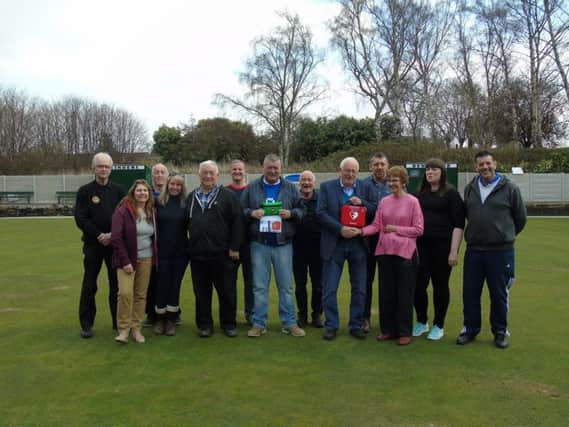 Members of the bowls club with Councillor Dave Allen and representatives from JJG Training and the Bowmen of Chesterfield