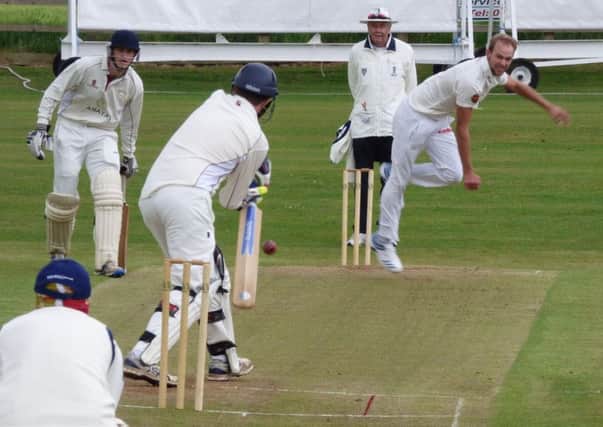 New South African signing Justin Dill in bowling action on his debut for Chesterfield.
