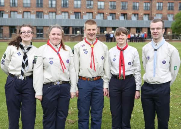Catherine Lawrence, second from right, took part in the St George's Day parade at Windsor Castle to mark her successful completion of the Queen's Scout award as a member of the 1st Whitwell Scout and Guide group.