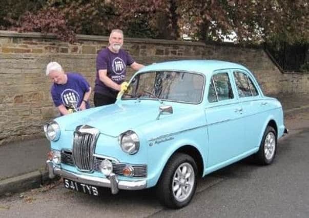 David Pipes and Gael Hepburn with trusty 1963 Riley, 'Blue Riley'.