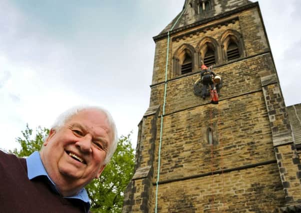 Rod Layton, a church warden at St Bartholomew's Church in Clay Cross with the clock during it's renovation by Cumbria Clock Company who were putting the finishing touches to the timepiece on Wednesday.