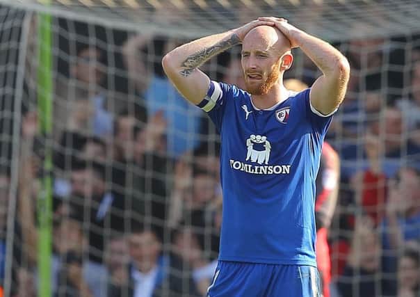 Drew Talbot has been released by Spireites.