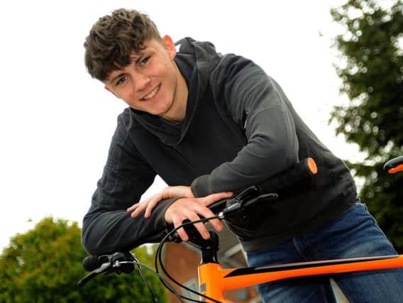 Hulainn Ravey, 15, is to cycle 30 miles to raise awareness of his dad Steve's rare incurable condition.