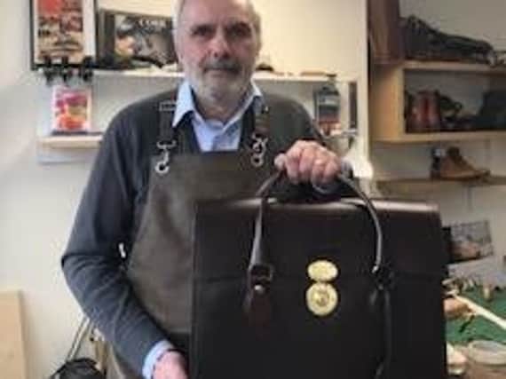 Owner of Ingmans, Andrew Ingman, with the 'world class' briefcase priced 3,995.