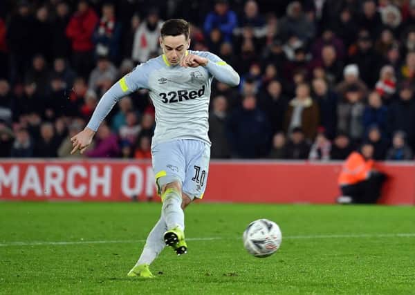 SOUTHAMPTON, ENGLAND - JANUARY 16:  Tom Lawrence of Derby County scores in the penalty shoot out in the FA Cup Third Round Replay match between Southampton FC and Derby County at St Mary's Stadium on January 16, 2019 in Southampton, United Kingdom.  (Photo by Dan Mullan/Getty Images)