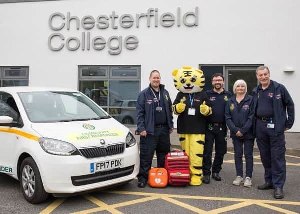 Some of the Chesterfield Community First Responder team with the lifesaving equipment sponsored by Chesterfield College. L to R - Simon Ashton, Rory the Responder, Mark Wilbourn, Debs Bennett and Tony Brown
