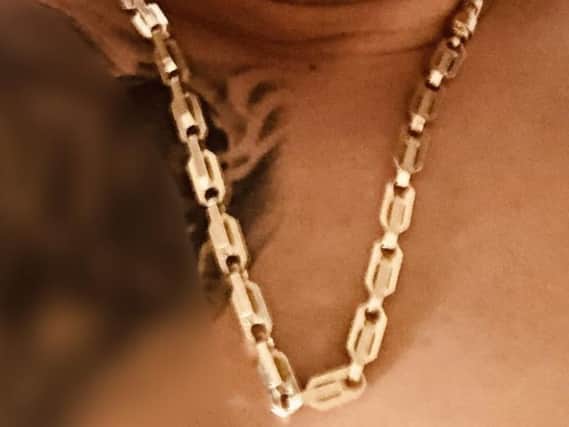 The man had this gold chain stolen from him.