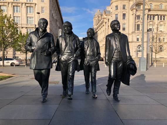 The Beatles Statue in Liverpool - just one of many cities in Britain proving to be a hit with tourists from around the world.