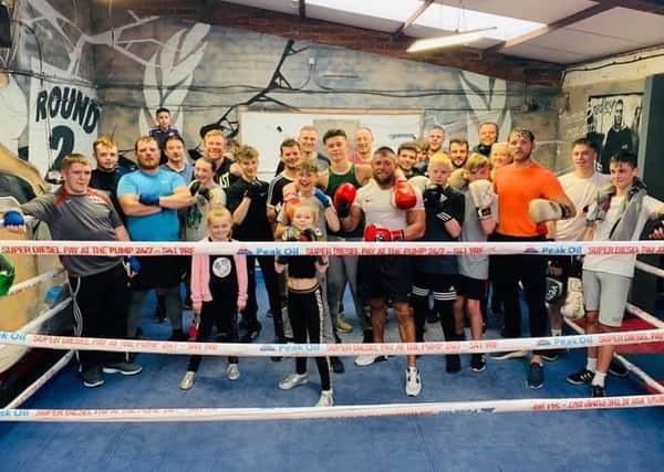 Ready to put on a sparkling show, enthusiastic members of the Spire Boxing Academy.