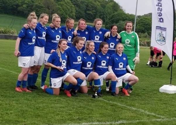 Chesterfield Ladies with their fourth trophy of the season