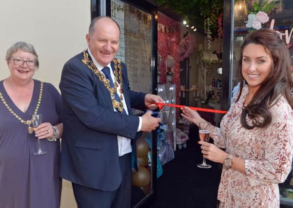 Timeless Creations a new wedding occasions shop opens in Chesterfield. Chesterfield Mayor and Mayoress Cllr Stuart and Anne Brittain cut the ribbon with owner Marilyn Henshaw.