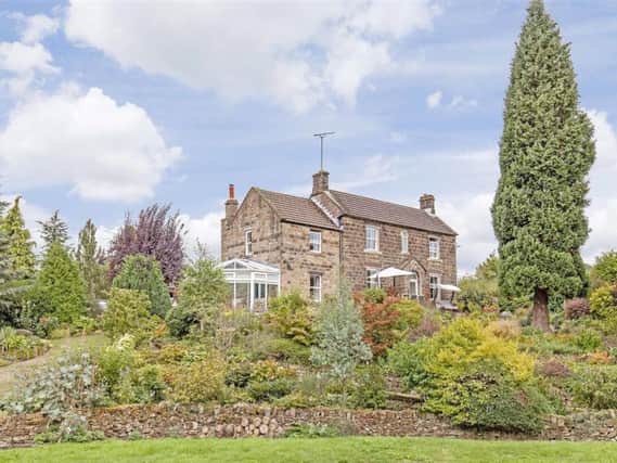 The property on Hunt Lane, Milltown, Ashover, which is on the market for 900,00.