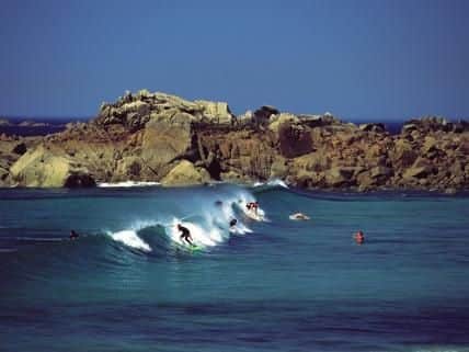 Surfing in Guernsey's Vazon Bay