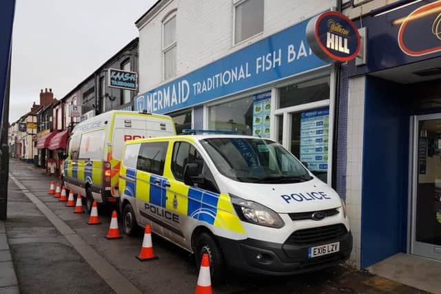 Police pictured outside Mermaid Fish Bar on Sheffield Road, Chesterfield, in December 2017. Andy Star owned the fish bar at the time.