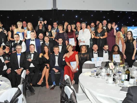 Winners and runners-up join together for a group photograph at the end of the 2018 awards ceremony