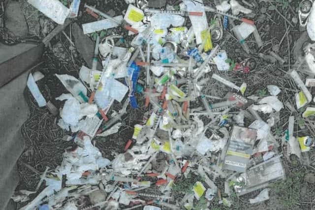 Chesterfield magistrates' court was presented with an image by NE Derbyshire District Council showing fly-tipping in the Tupton area with dumped hypodermic needles and drug paraphernalia associated with heroin use.