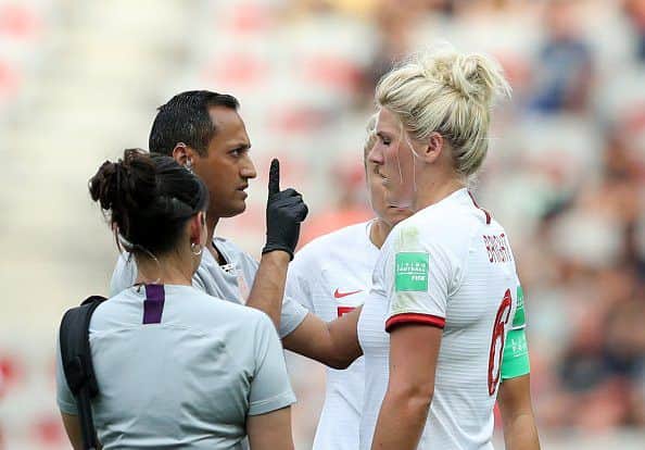 NICE, FRANCE - JUNE 09: Millie Bright of England receives medical attention during the 2019 FIFA Women's World Cup France group D match between England and Scotland at Stade de Nice on June 09, 2019 in Nice, France. (Photo by Hannah Peters - FIFA/FIFA via Getty Images)